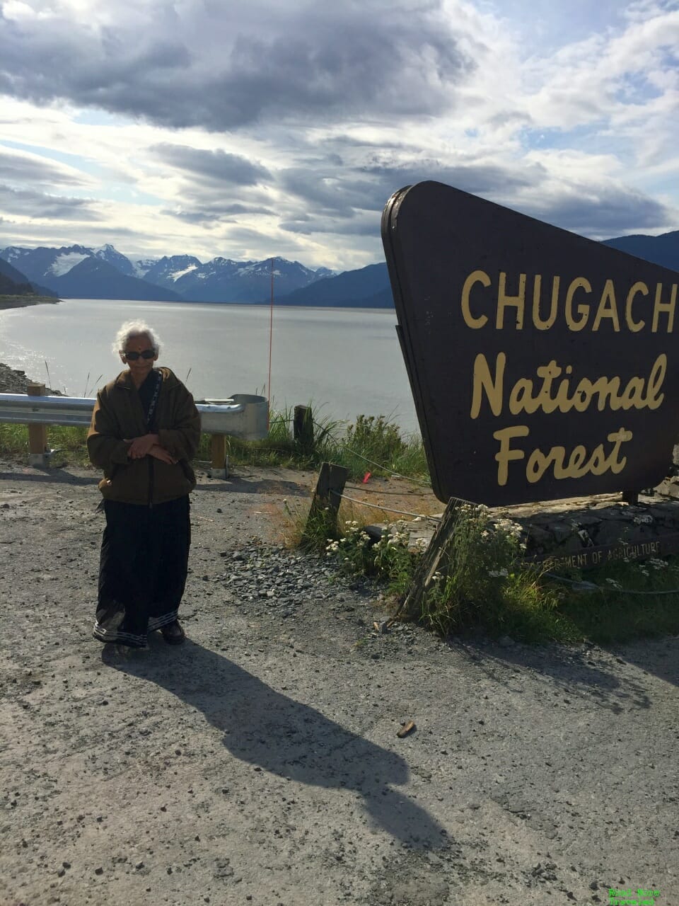 Mom posing in a glacial background