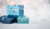 a group of blue boxes with bows