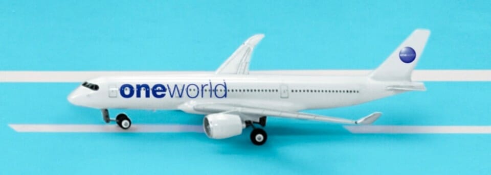 a white airplane on a blue background