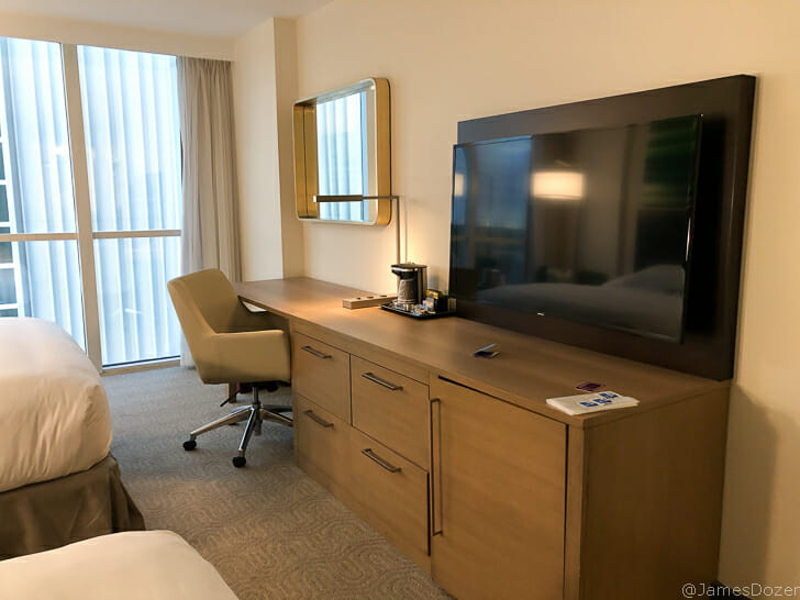 a room with a television and a chair