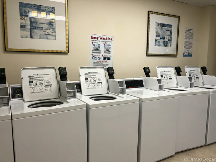 a group of washing machines in a room