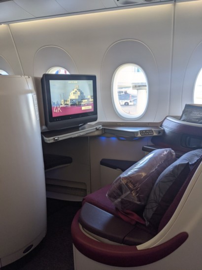 a tv on a table in an airplane