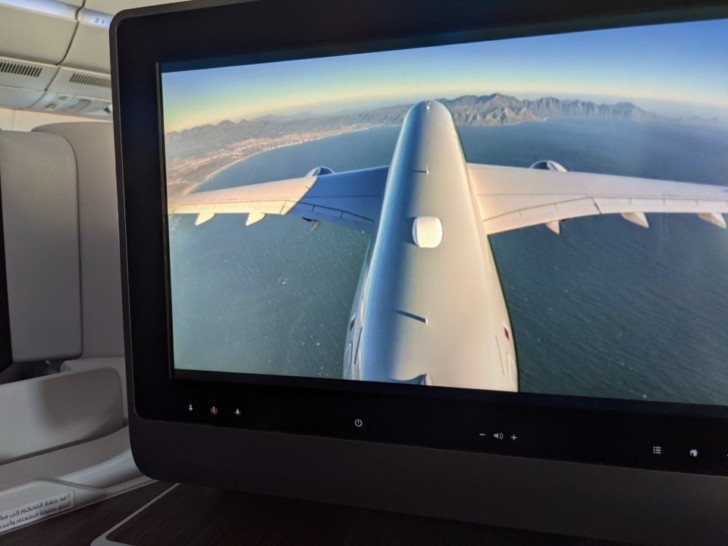 a screen with an airplane wing on it