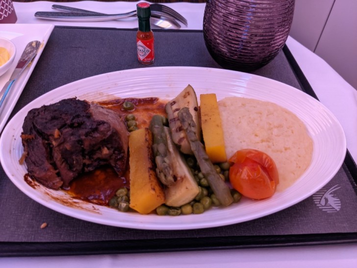 a plate of food on a tray