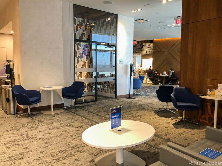 a room with chairs and tables