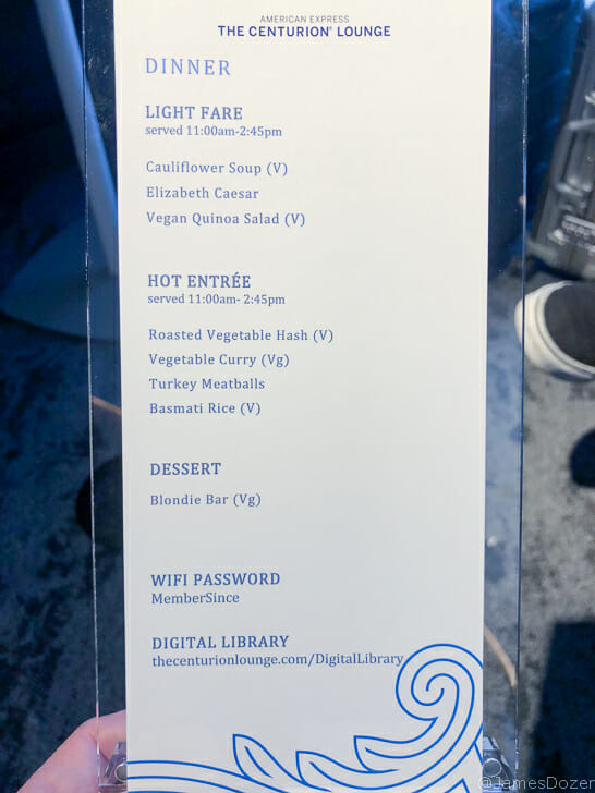 a menu on a glass shelf