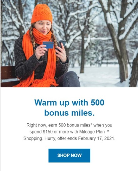 a woman sitting on a bench in the snow