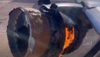 a jet engine with a fire coming out of it