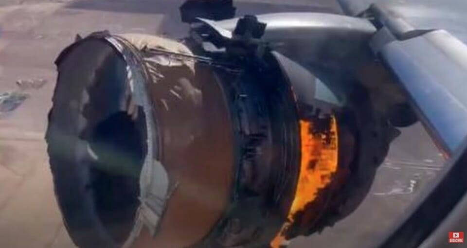 a jet engine with a fire coming out of it