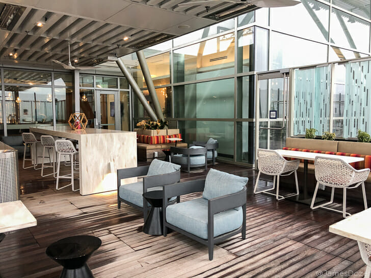 a room with chairs and tables