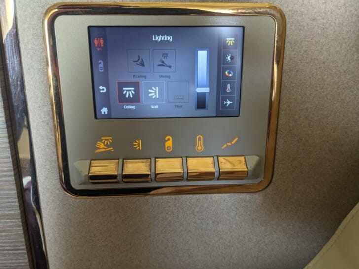 a screen with buttons and switches on a wall