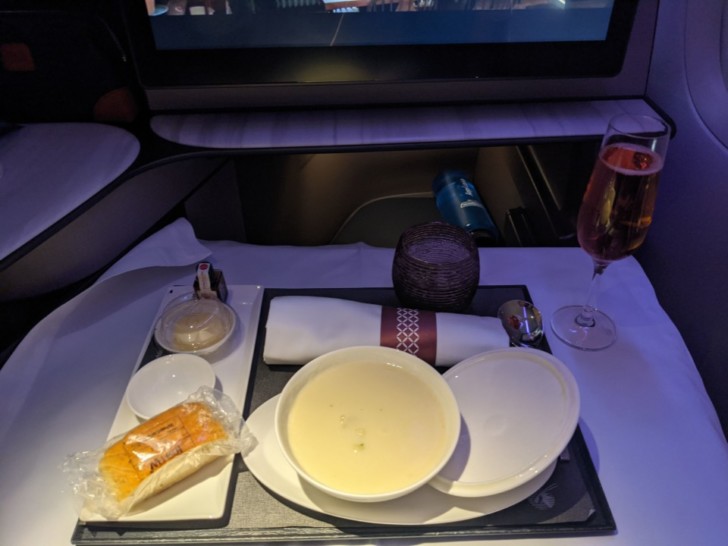 a tray with food and a drink on it