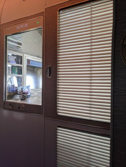 a window with blinds on the side