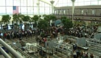 a large group of people in an airport