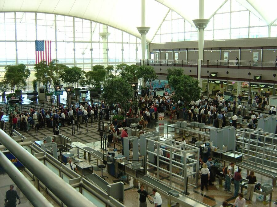 a large group of people in an airport