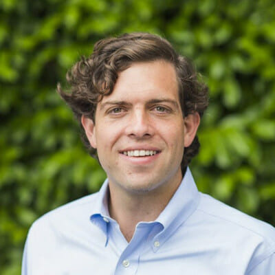 a man smiling for a picture