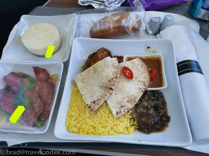 a plate of food on a tray