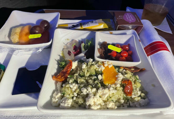a plate of food on a tray