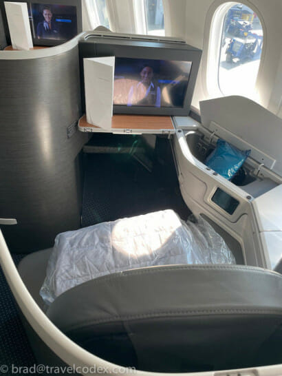 a tv on the side of a chair