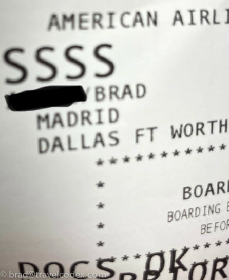 a close-up of a boarding pass