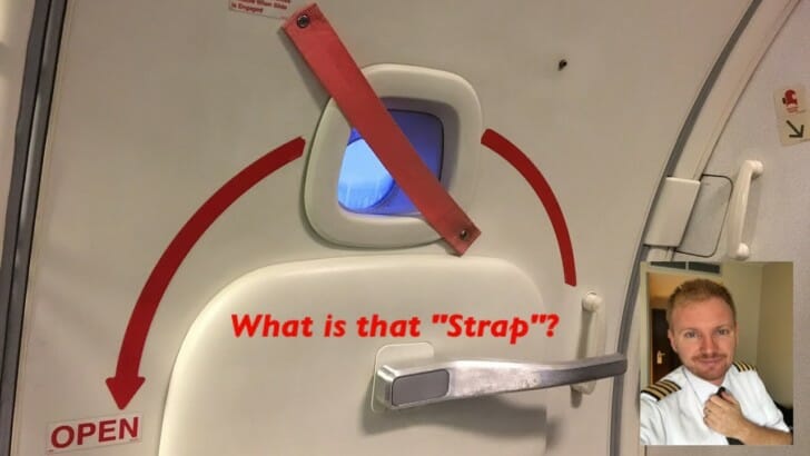 a door handle with a red stripe