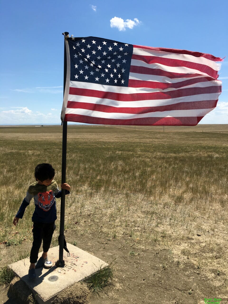 Son with giant American flag