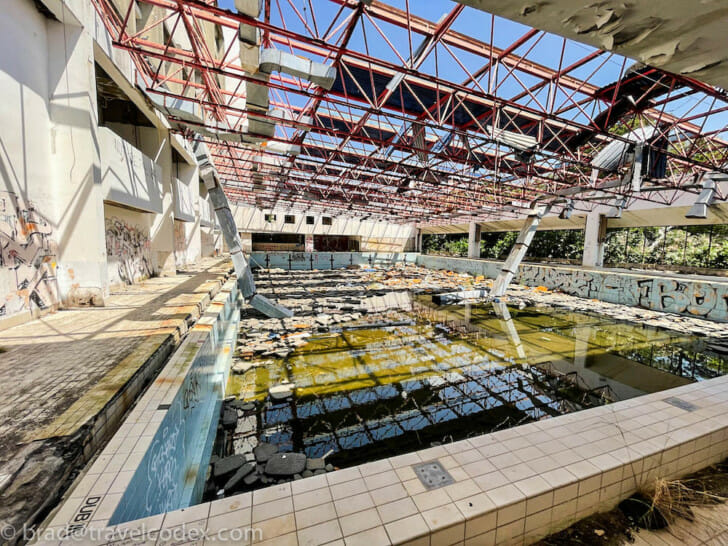 a pool with water and graffiti