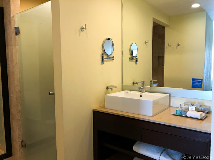 a bathroom with a sink and mirror