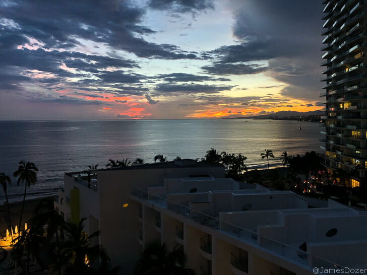 a sunset over a beach
