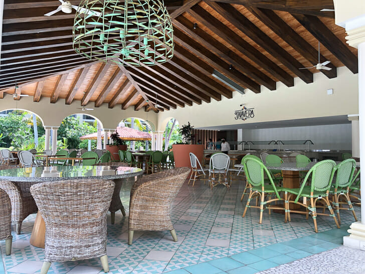 a room with tables and chairs