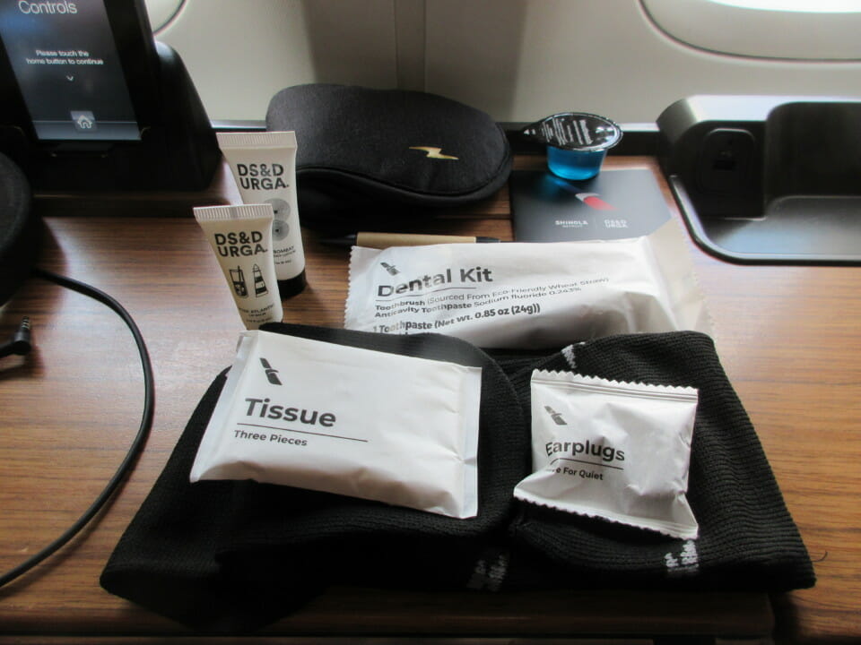 a group of small packages of travel items on a table