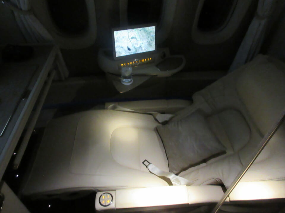 a seat with a screen on it
