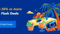 a blue and orange cocktails on a beach