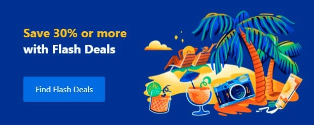 a blue and orange cocktails on a beach