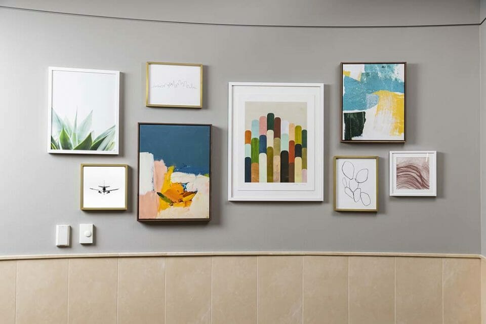 a wall with pictures on it