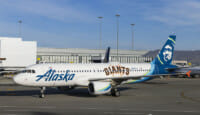 a white airplane on a tarmac
