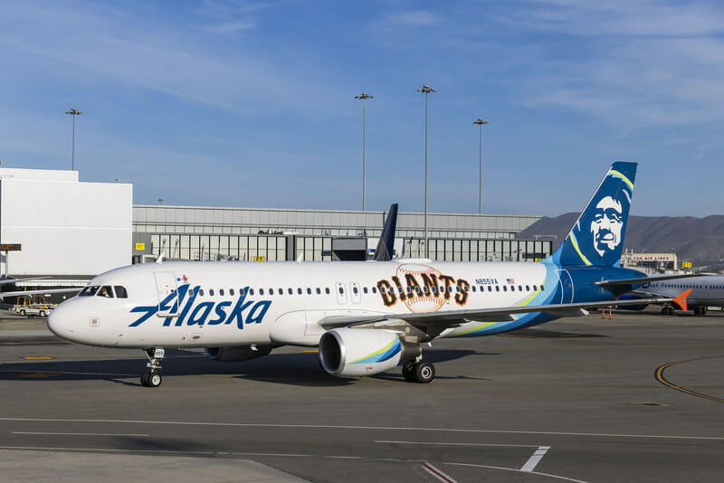 a white airplane on a tarmac