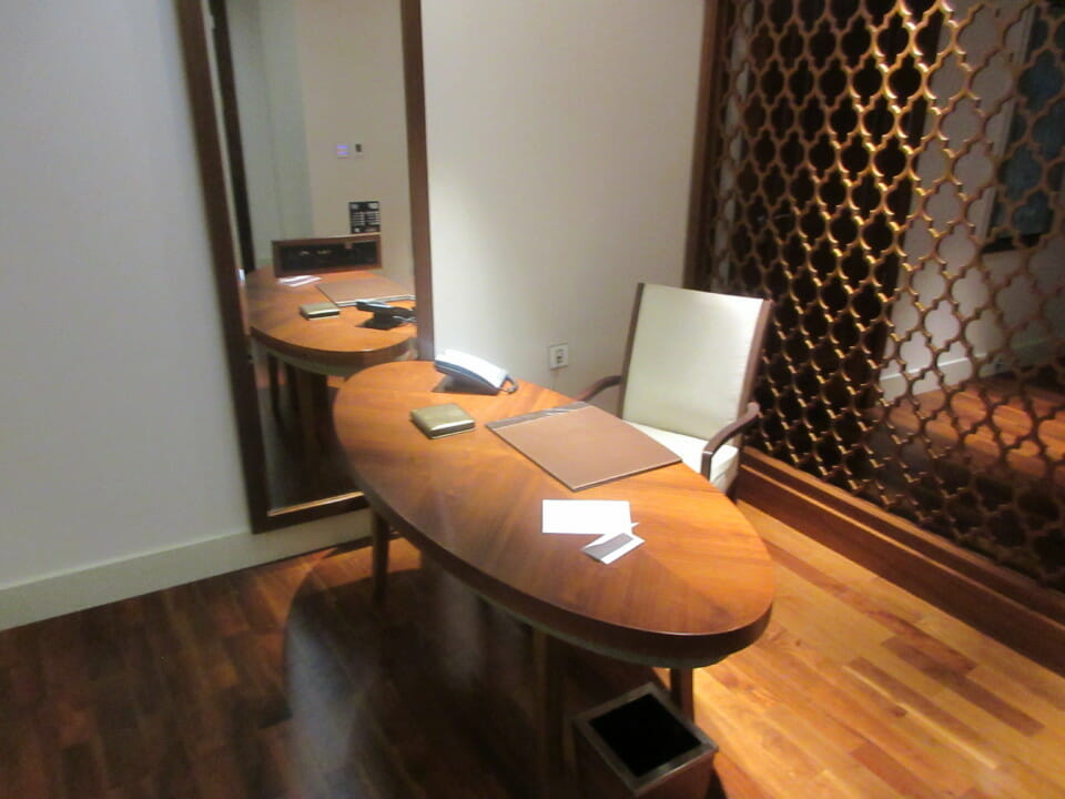 a desk and chair in a room