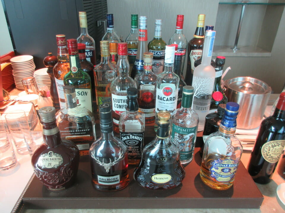 a group of bottles of alcohol on a table