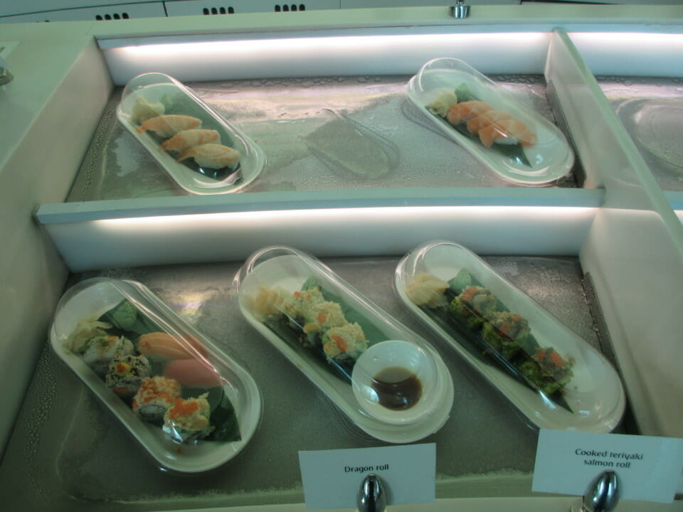 a trays of sushi in a tray