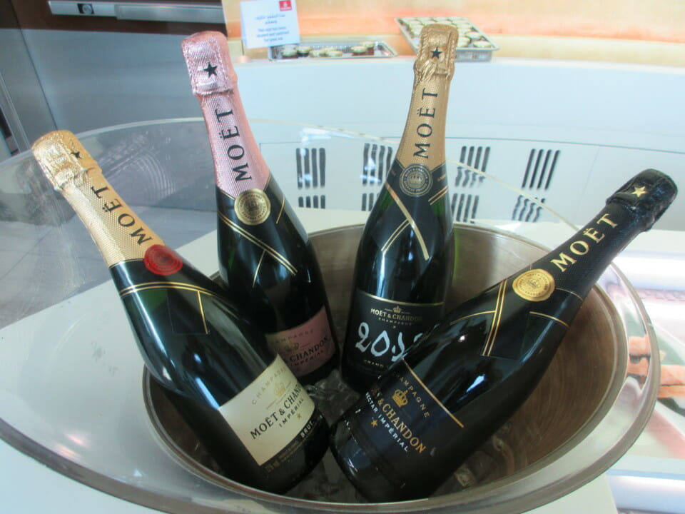 a group of bottles in a bowl