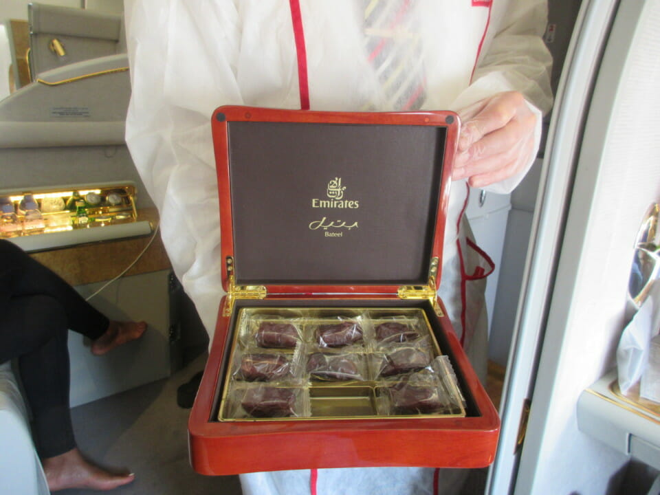 a person holding a box of chocolates