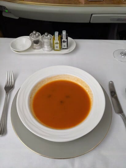 a bowl of soup on a plate