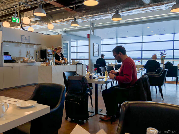a man sitting at a table in a restaurant