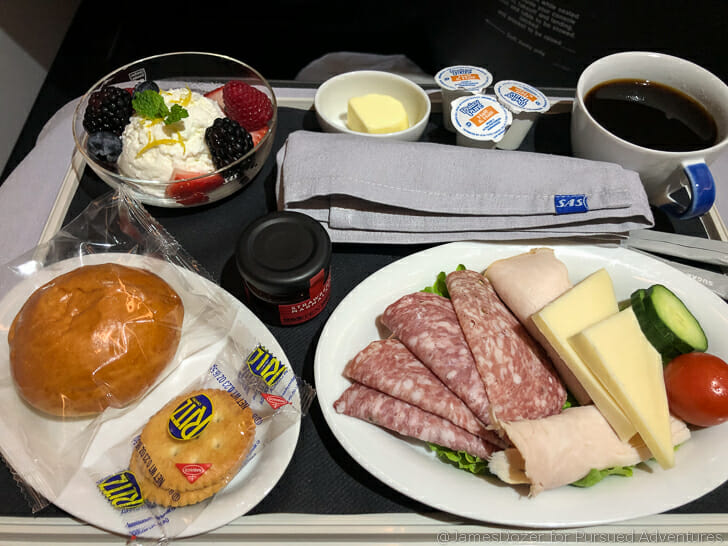a tray of food on a plane