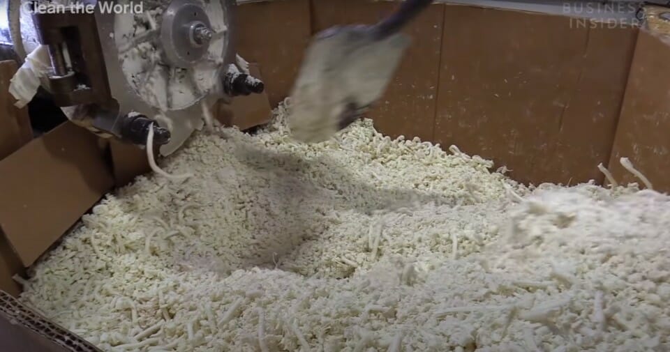 a machine with a white object in it