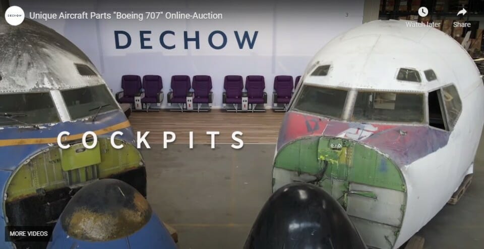 a group of planes in a room with chairs