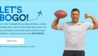 a man holding a football