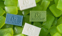 a pile of green and white candy