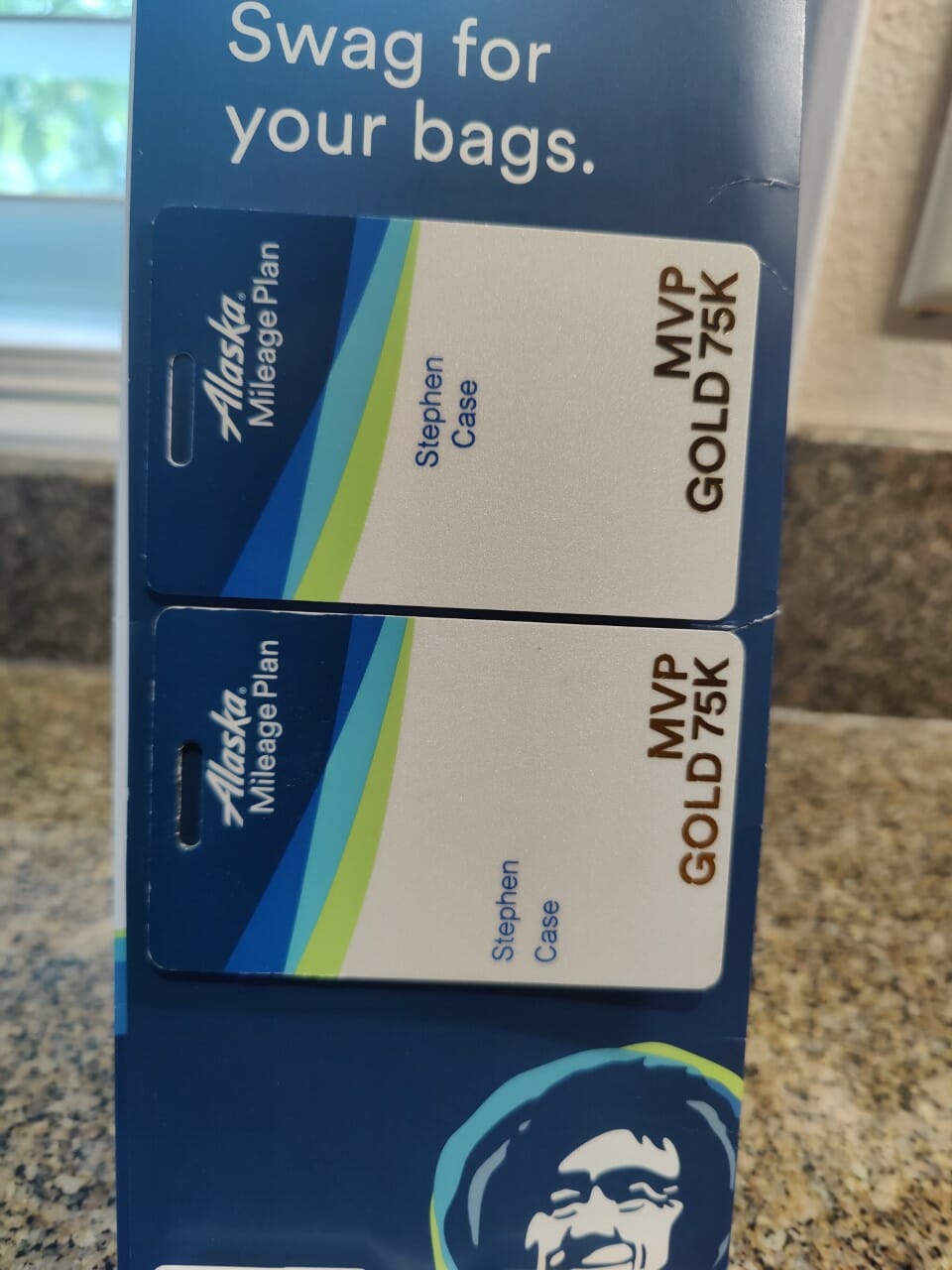 a blue and white card box